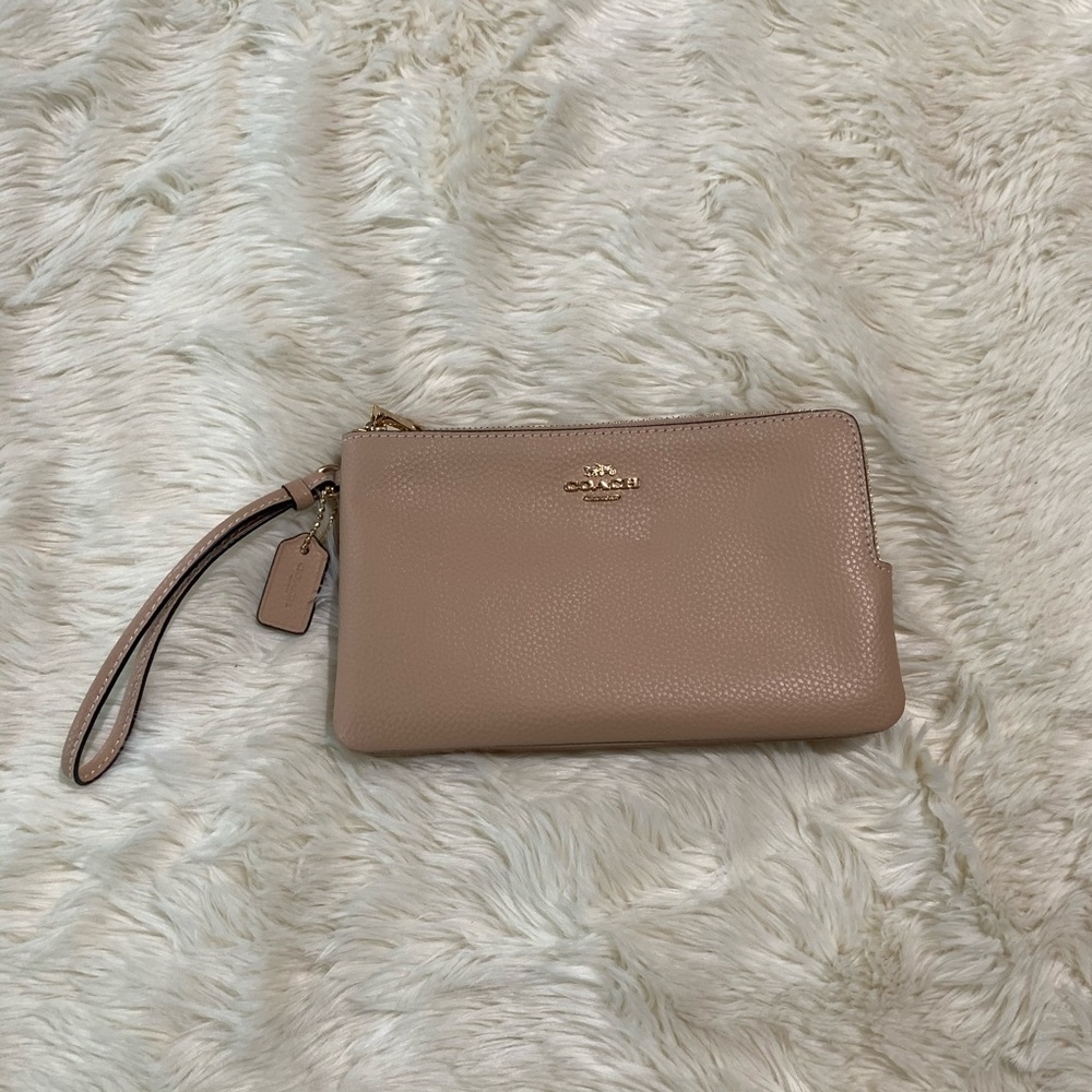 Brand new Coach light pink wristlet